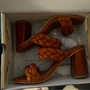Brand new, never worn. Chunky heel braided sandal